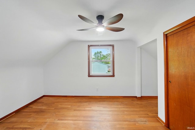 3560 Sandpoint Rd, Fort Wayne, IN 46809 - additional living space with a ceiling fan, light wood finished floors, lofted ceiling, and baseboards