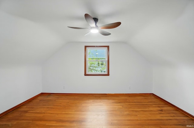 3560 Sandpoint Rd, Fort Wayne, IN 46809 - bonus room featuring a ceiling fan, wood finished floors, lofted ceiling, and baseboards