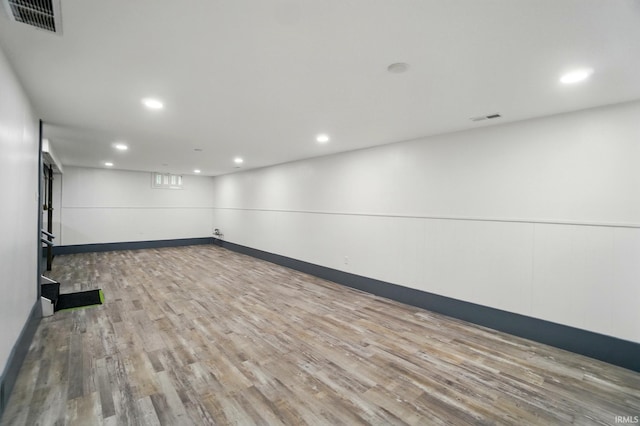 3560 Sandpoint Rd, Fort Wayne, IN 46809 - spare room featuring wood finished floors, recessed lighting, and baseboards