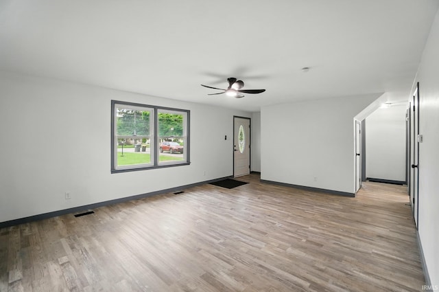 3560 Sandpoint Rd, Fort Wayne, IN 46809 - spare room featuring ceiling fan, light wood-style floors, and baseboards