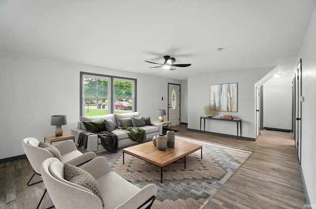 3560 Sandpoint Rd, Fort Wayne, IN 46809 - living room with a ceiling fan, light wood finished floors, and baseboards