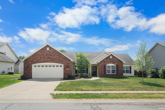 3934 Rushgrove Dr, Lafayette, IN 47909 - view of front facade with brick siding, a garage, concrete driveway, a front yard, and central AC