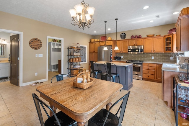 3934 Rushgrove Dr, Lafayette, IN 47909 - dining area with a chandelier, light tile patterned floors, baseboards, and recessed lighting