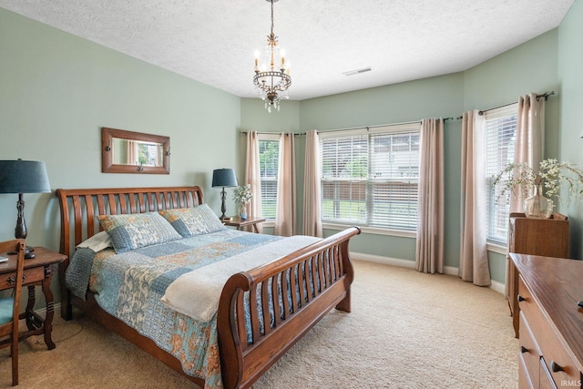 3934 Rushgrove Dr, Lafayette, IN 47909 - bedroom featuring carpet, a chandelier, a textured ceiling, and baseboards