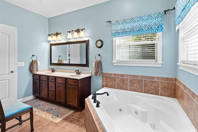 3934 Rushgrove Dr, Lafayette, IN 47909 - full bath with a whirlpool tub, double vanity, and tile patterned flooring