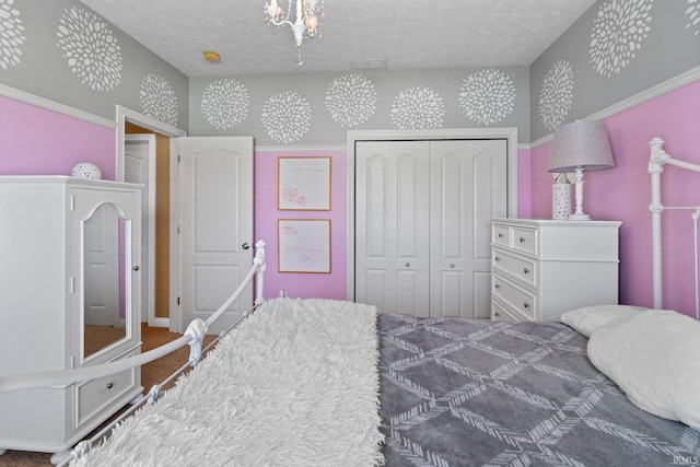 3934 Rushgrove Dr, Lafayette, IN 47909 - carpeted bedroom featuring a closet and a textured ceiling
