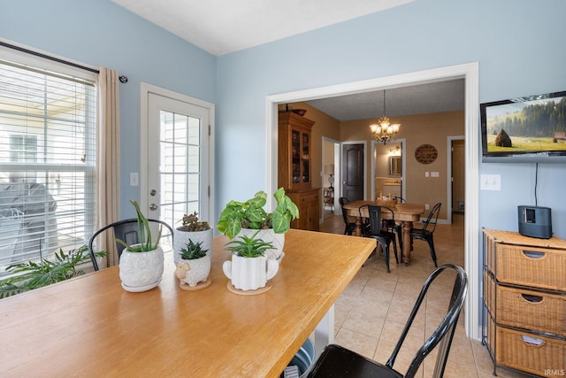 3934 Rushgrove Dr, Lafayette, IN 47909 - dining room featuring a chandelier and light tile patterned floors
