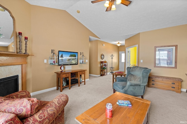 3934 Rushgrove Dr, Lafayette, IN 47909 - carpeted living room with lofted ceiling, ceiling fan, baseboards, and a tiled fireplace