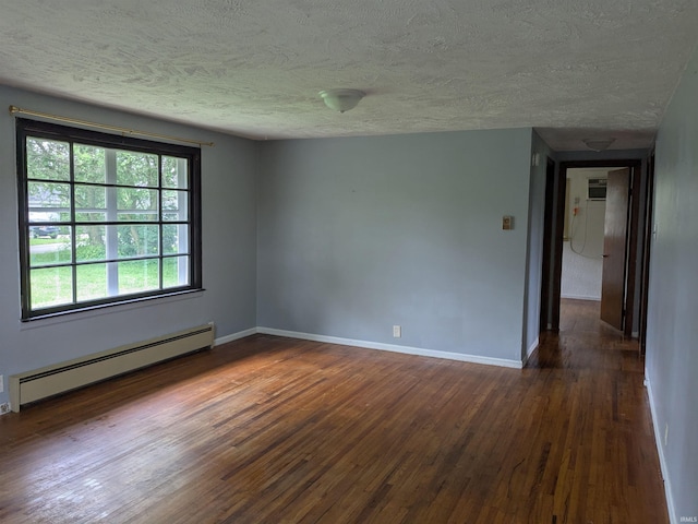empty room featuring a baseboard radiator, dark wood-style floors, baseboards, and a textured ceiling
