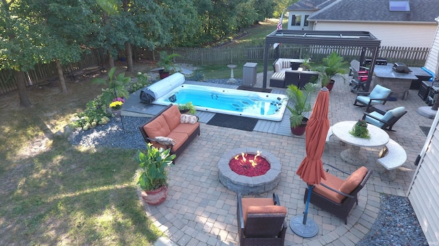 6326 Treasure Cv, Fort Wayne, IN 46835 - view of pool with an outdoor living space with a fire pit, a fenced backyard, and a patio