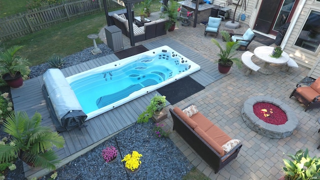 6326 Treasure Cv, Fort Wayne, IN 46835 - view of pool featuring an outdoor hot tub, a patio area, and an outdoor hangout area