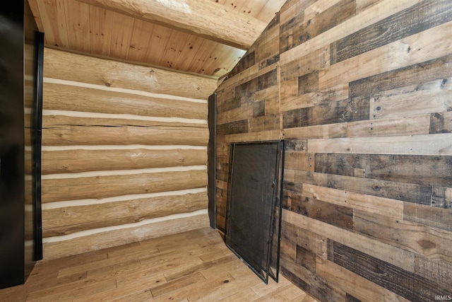 7428 E 400 N Rd, Rolling Prairie, IN 46371 - detailed view of wooden ceiling with exposed beams, wood finished floors, wooden walls, and log walls