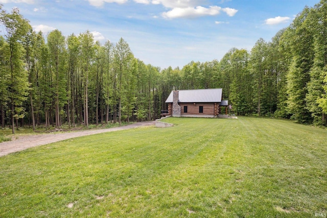 7428 E 400 N Rd, Rolling Prairie, IN 46371 - view of green lawn featuring a view of trees
