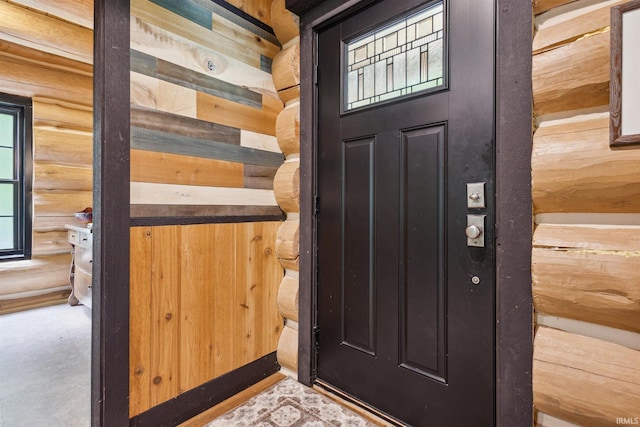 7428 E 400 N Rd, Rolling Prairie, IN 46371 - entrance foyer featuring rustic walls