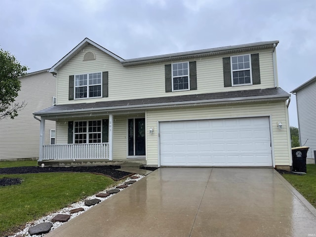 201 Riley Dr, Fort Wayne, IN 46825 - traditional-style house featuring a porch, concrete driveway, a front lawn, and a garage