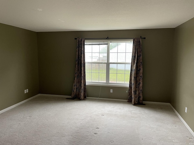 201 Riley Dr, Fort Wayne, IN 46825 - empty room with carpet floors and baseboards