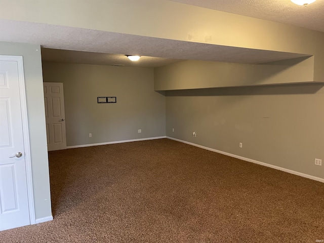 201 Riley Dr, Fort Wayne, IN 46825 - finished basement with dark carpet, a textured ceiling, and baseboards