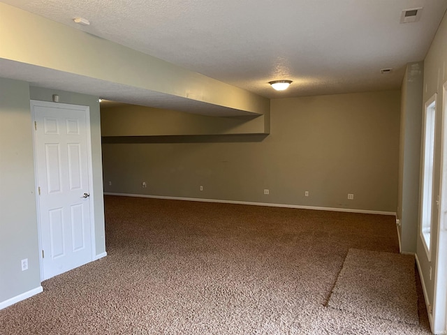 201 Riley Dr, Fort Wayne, IN 46825 - empty room featuring carpet flooring, baseboards, and a textured ceiling