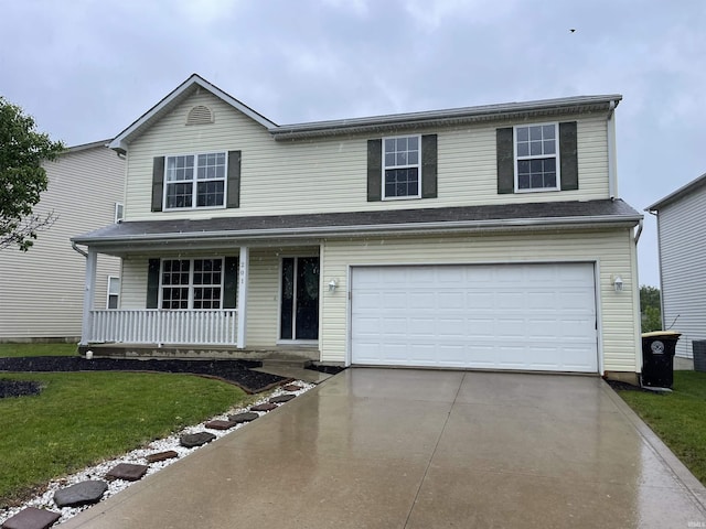 201 Riley Dr, Fort Wayne, IN 46825 - traditional home featuring a porch, concrete driveway, a front yard, and a garage