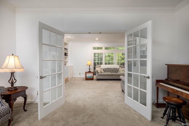 9838 Gulfstream Ct, Fishers, IN 46037 - living area featuring french doors, ornamental molding, carpet, and baseboards