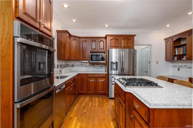 9838 Gulfstream Ct, Fishers, IN 46037 - kitchen featuring stainless steel appliances, crown molding, a sink, tasteful backsplash, and open shelves