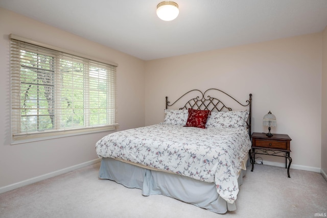 9838 Gulfstream Ct, Fishers, IN 46037 - bedroom with baseboards and light carpet
