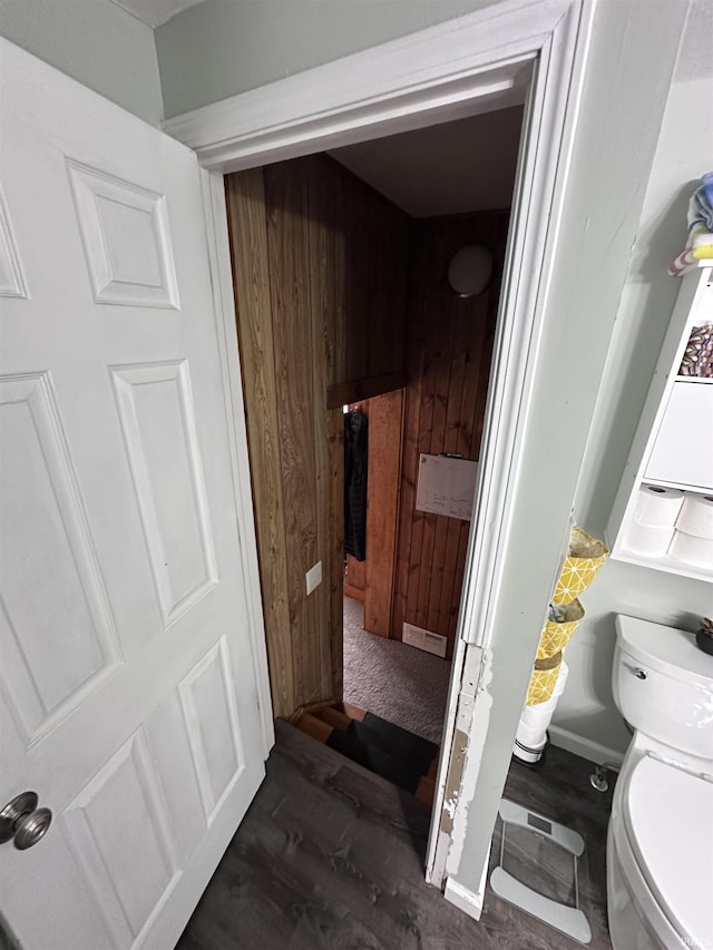 201 W Waid Ave, Muncie, IN 47303 - bathroom with toilet, wood finished floors, and wood walls