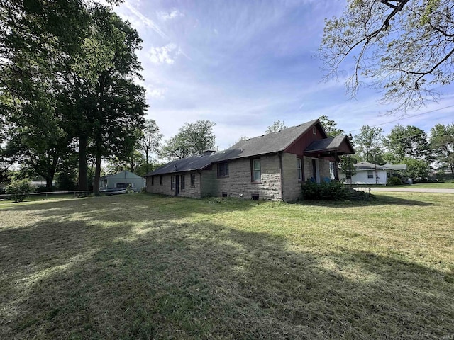 201 W Waid Ave, Muncie, IN 47303 - view of side of home featuring stone siding and a chimney
