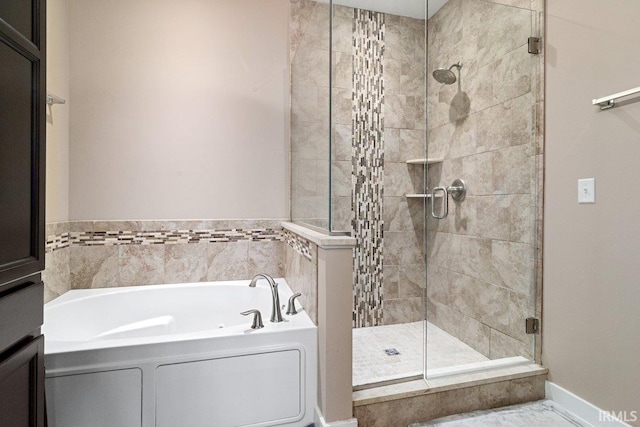 3102 Paradise Cir, Newburgh, IN 47630 - bathroom featuring a garden tub and a shower stall