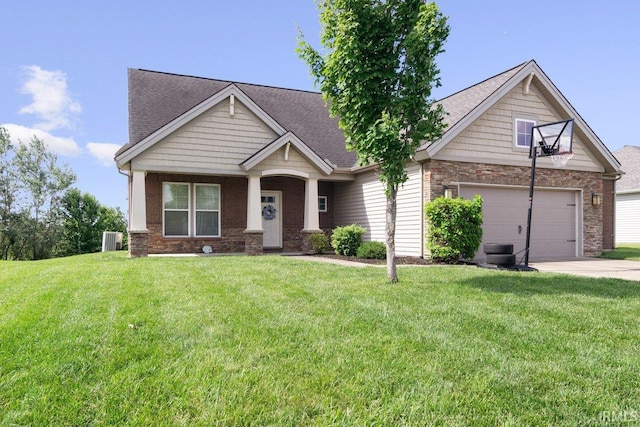 3102 Paradise Cir, Newburgh, IN 47630 - craftsman-style house featuring central air condition unit, a front yard, driveway, and an attached garage