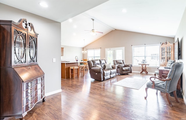 2108 Longway Ct, Evansville, IN 47711 - living area with beam ceiling, a ceiling fan, wood finished floors, baseboards, and high vaulted ceiling