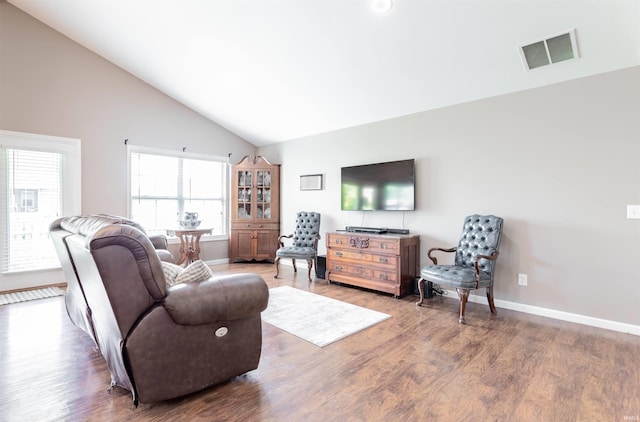 2108 Longway Ct, Evansville, IN 47711 - living room featuring wood finished floors, baseboards, and high vaulted ceiling