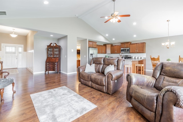 2108 Longway Ct, Evansville, IN 47711 - living area featuring a chandelier, a ceiling fan, wood finished floors, high vaulted ceiling, and recessed lighting