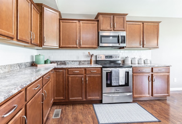 2108 Longway Ct, Evansville, IN 47711 - kitchen featuring stainless steel appliances, dark wood-type flooring, backsplash, and brown cabinets
