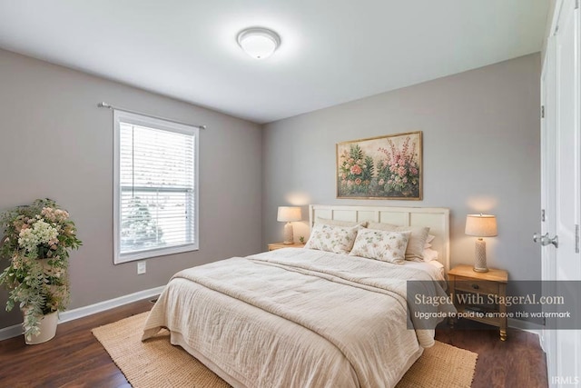 2108 Longway Ct, Evansville, IN 47711 - bedroom featuring baseboards and dark wood-type flooring