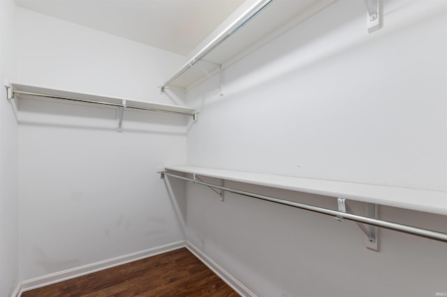 2108 Longway Ct, Evansville, IN 47711 - walk in closet featuring dark wood-style flooring