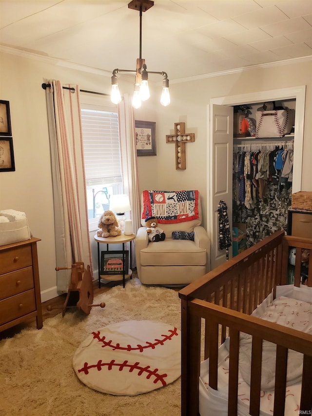 301 Raleigh Rd, Galveston, IN 46932 - bedroom with crown molding, a closet, a ceiling fan, and carpet
