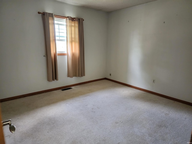 205 Holly Ln, Geneva, IN 46740 - empty room with carpet and baseboards