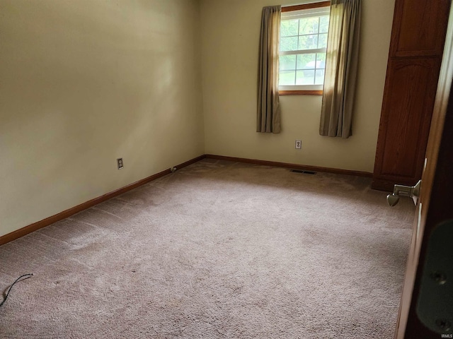 205 Holly Ln, Geneva, IN 46740 - unfurnished room featuring carpet flooring and baseboards