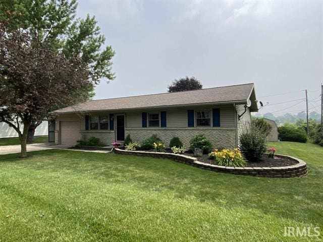 205 Holly Ln, Geneva, IN 46740 - single story home featuring an attached garage, a front yard, brick siding, and concrete driveway