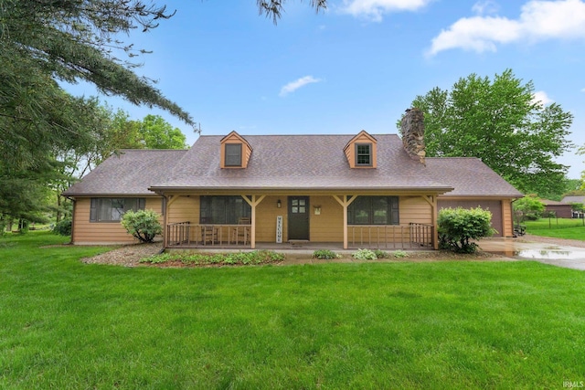 103 Ironwood Ave, Kendallville, IN 46755 - view of front facade with an attached garage, a porch, a front yard, a chimney, and concrete driveway