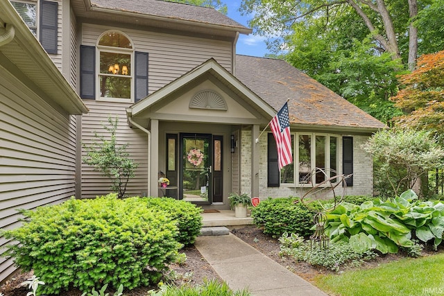 125 Durkees Run Dr, Lafayette, IN 47905 - property entrance featuring roof with shingles and brick siding