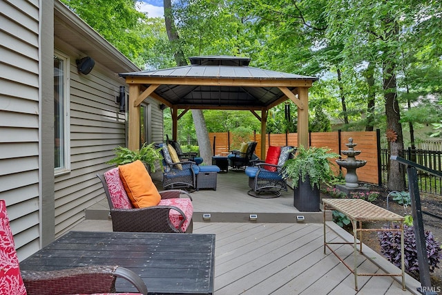 125 Durkees Run Dr, Lafayette, IN 47905 - wooden terrace featuring an outdoor hangout area, a gazebo, and view of scattered trees
