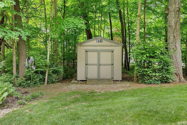 125 Durkees Run Dr, Lafayette, IN 47905 - view of shed featuring a wooded view