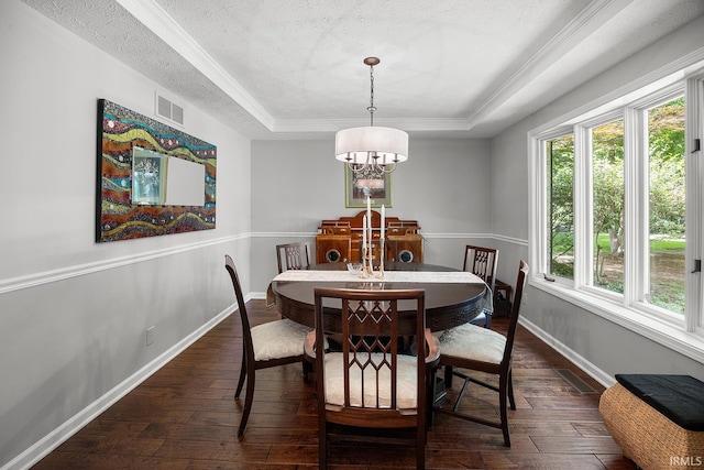 125 Durkees Run Dr, Lafayette, IN 47905 - dining area with a tray ceiling, plenty of natural light, dark wood-style flooring, a textured ceiling, and crown molding