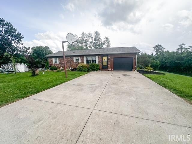 11239 Thomas Dr, Evansville, IN 47712 - ranch-style house with an attached garage, a front yard, and driveway