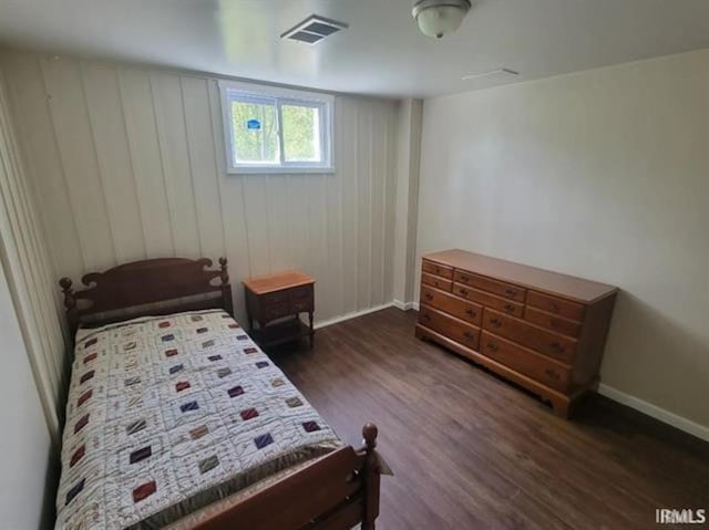 2347 E Navaho Dr, Vincennes, IN 47591 - bedroom with dark wood-style flooring and baseboards