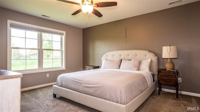 2014 Buell Dr, Angola, IN 46703 - bedroom featuring baseboards, carpet, and a ceiling fan