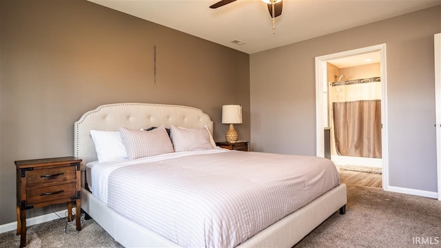 2014 Buell Dr, Angola, IN 46703 - carpeted bedroom featuring baseboards, connected bathroom, and a ceiling fan