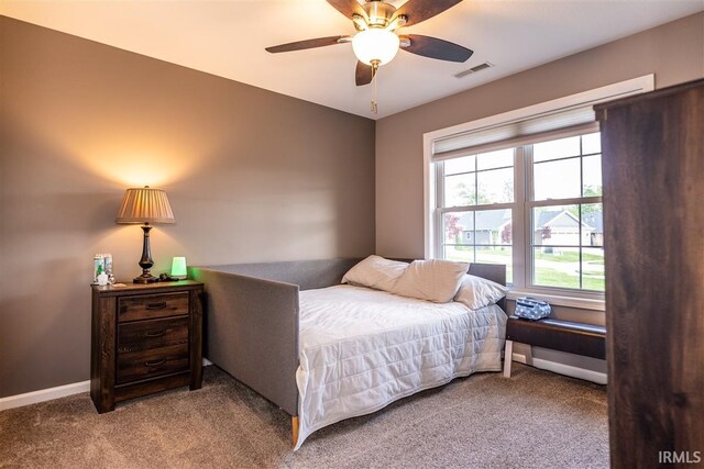 2014 Buell Dr, Angola, IN 46703 - bedroom featuring carpet flooring, baseboards, and ceiling fan